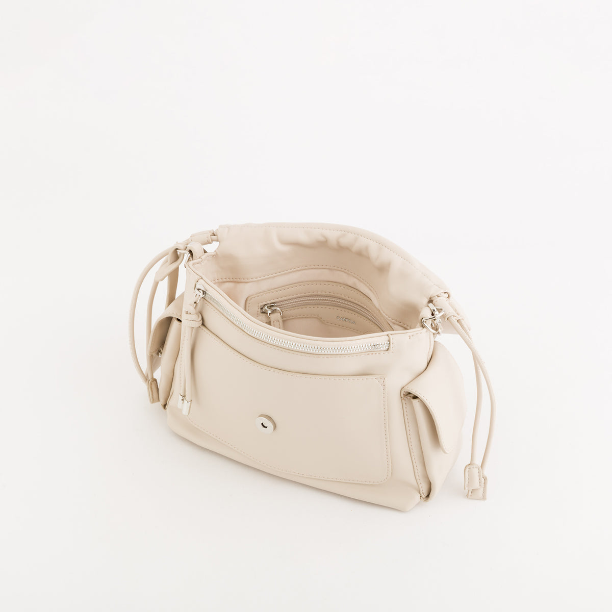 A light beige leather shoulder bag with multiple zippered compartments and drawstring details, shown from an angled top view on a white background.